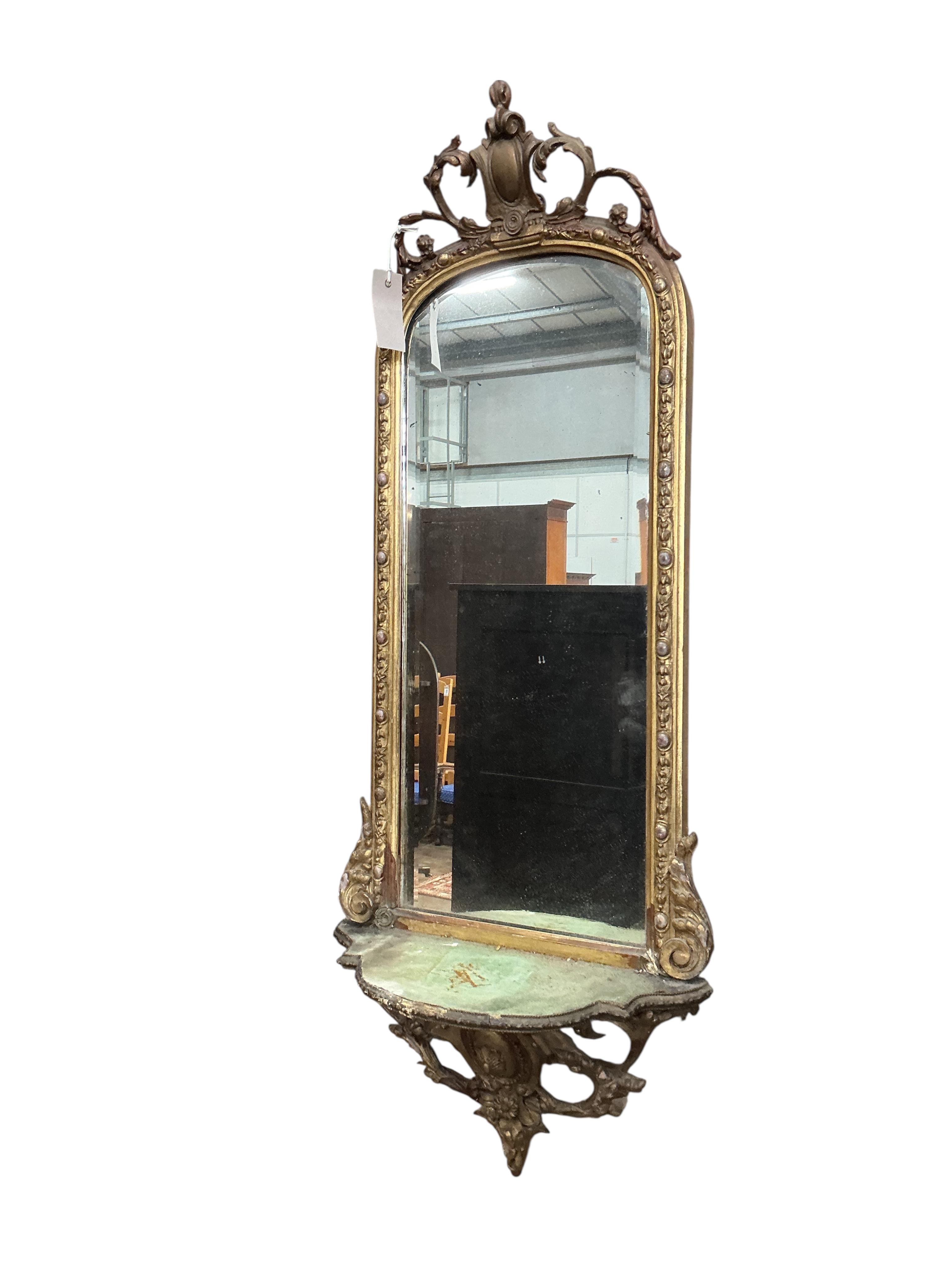 A Victorian giltwood and composition wall mirror, width 38cm, height 98cm